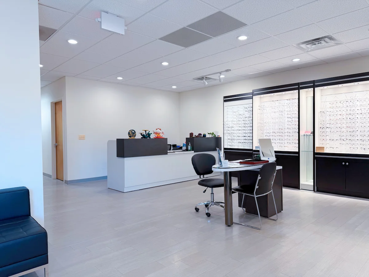 Modern reception desk and eyewear display at Amwell Eye Care in Hillsborough, New Jersey